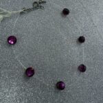 Βραχιόλι με μωβ-ροζ κρύσταλλα Swarovski σε διάφανη πετονιά